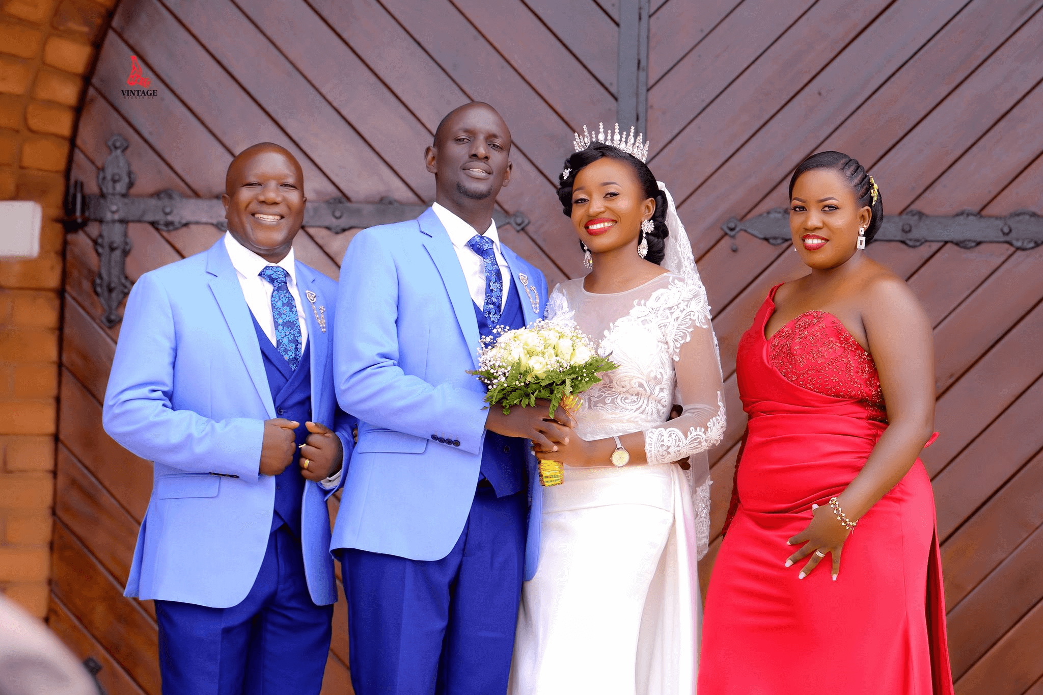 couple and relatives at a wedding ceremony by vintage media and events